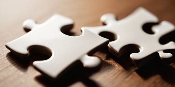 what is a synergy in mergers